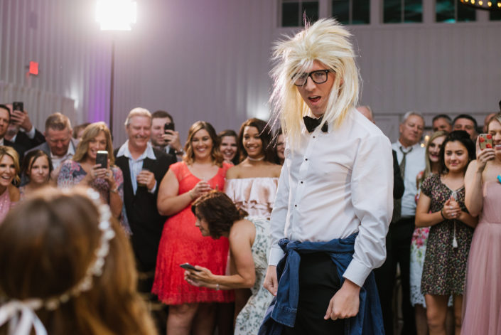 Groom dresses up for garter toss in Houston